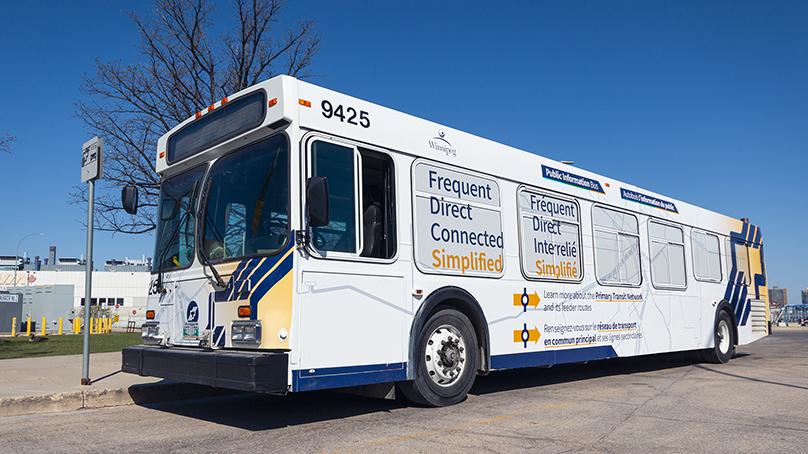 Winnipeg Transit bus with Primary Transit decals on the side