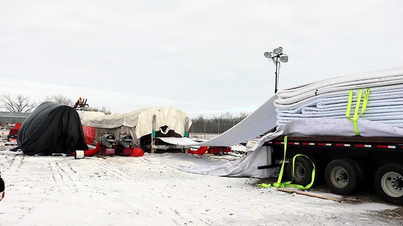 The felt lining going into a heated tent to add the resin