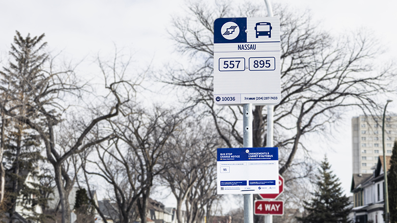 bus stop sign at a bus stop