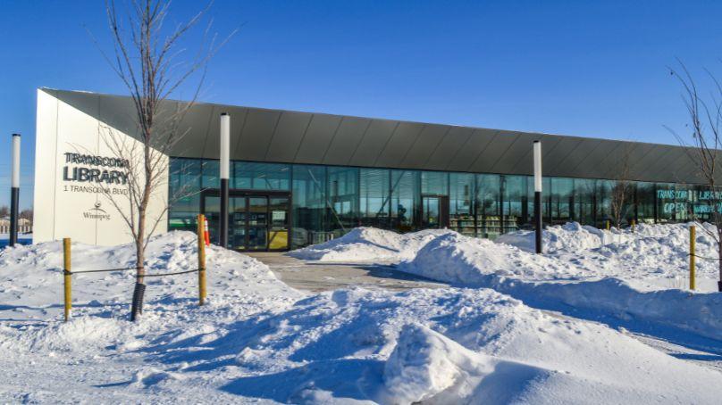 Entrance to the Transcona Library on a blue-sky day in winter