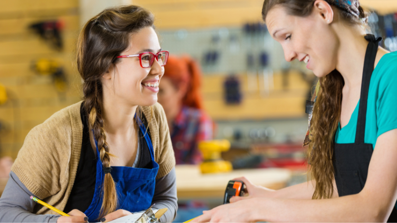Two people working together in a makerspace