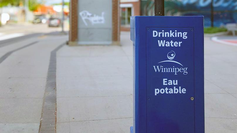 Drinking water station on a sidewalk