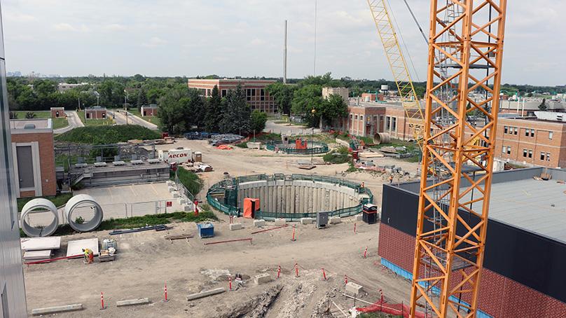 a construction site with a large hole in the ground