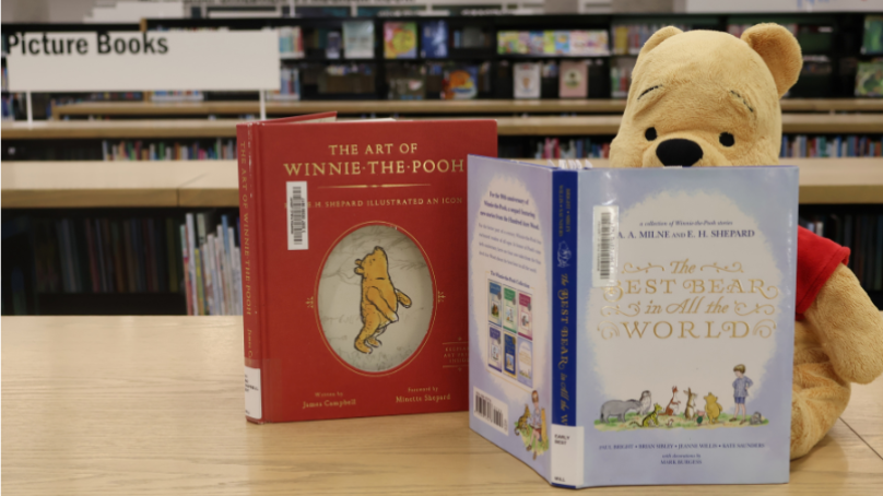Winnie-the-Pooh books on display at a library