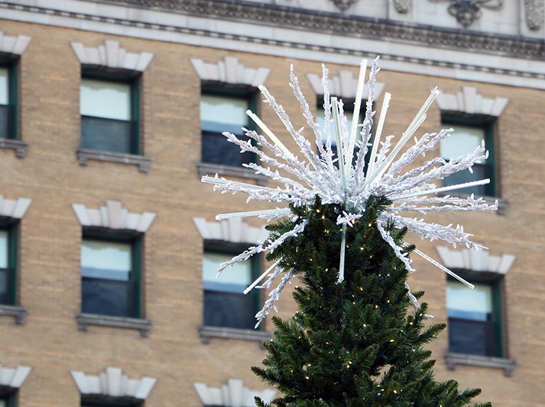 The new City Hall Christmas tree being installed