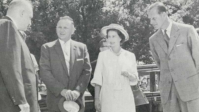 Queen Elizabeth II and Prince Philip being presented to Alderman Harvey by Mayor Stephen Juba.