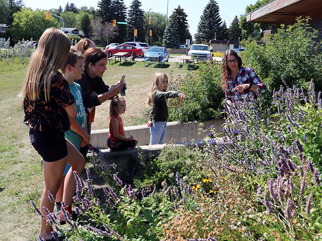 The Loving Lemons Lemonade Stand organizers were given a tour of the Living Prairie Museum to learn more about pollinator conservation.