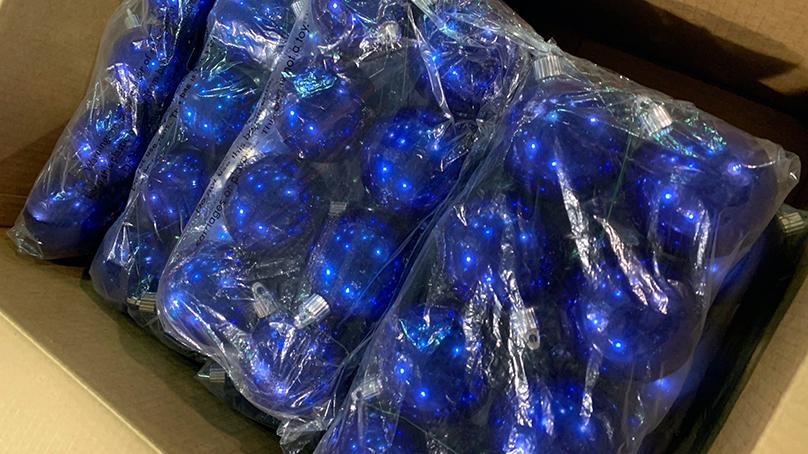 The tree is covered in more than 9,000 ornaments.