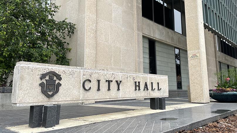 The current City of Winnipeg crest on the City Hall sign.