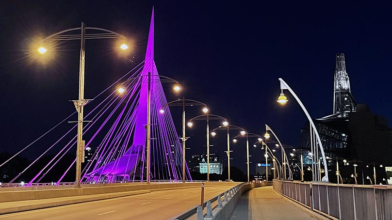 The new lighting system on Esplanade Riel can be programmed to illuminate the bridge in any colour.
