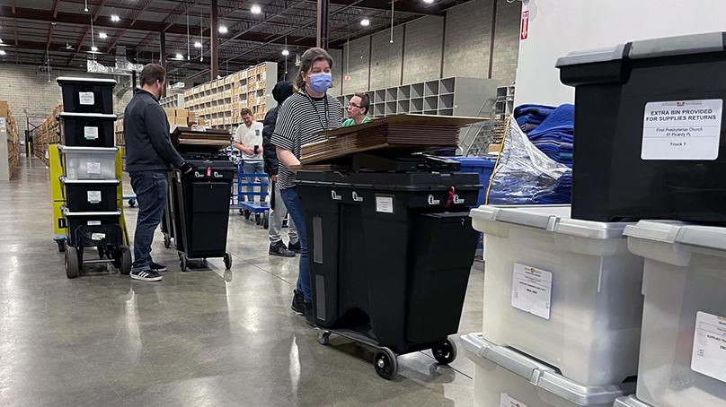 Voting location supply packing underway at the election warehouse.
