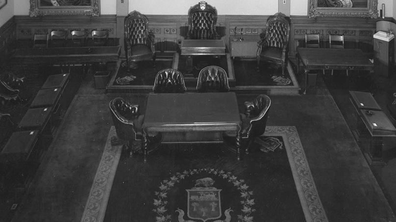 The Council Chambers in the old City Hall where the original crest appears on the carpet. This photo was taken by Henry Kalen in 1961. City of Winnipeg Archives Photograph Collection