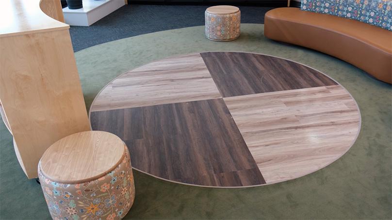 A medicine wheel design was incorporated into the flooring in the space.