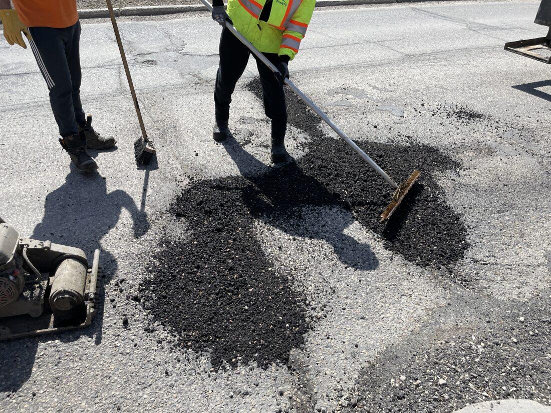 Crews patched a number of potholes in the Island Lakes neighbourhood this week using the new trial brew of cold recycled asphalt and a solution called Road Soup.