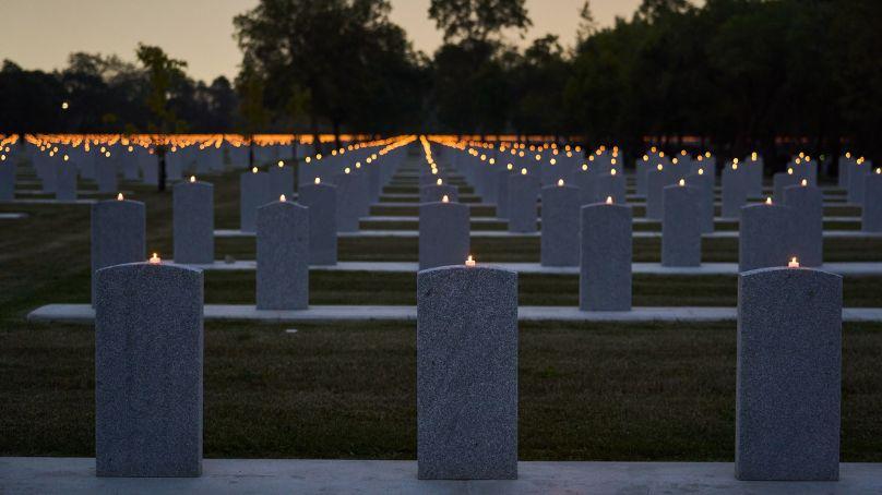 Over 10,000 candles were placed on the tombstones of veterans at the Winnipeg 150 candlelight ceremony