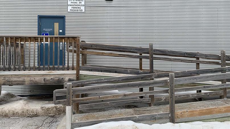 Accessible entrance with ramp on the south side of the building