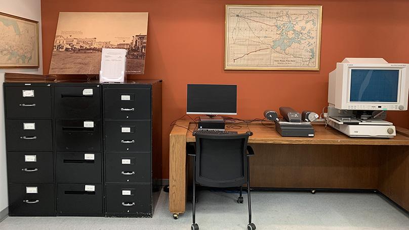 Computer terminal and microfilm station in research room