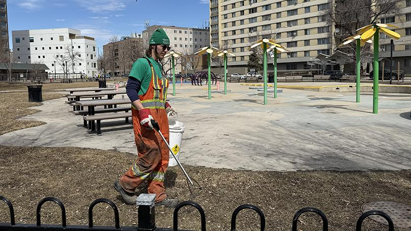 The Neighbourhood Action Team picks up debris in Central Park during the Downtown beautification blitz.
