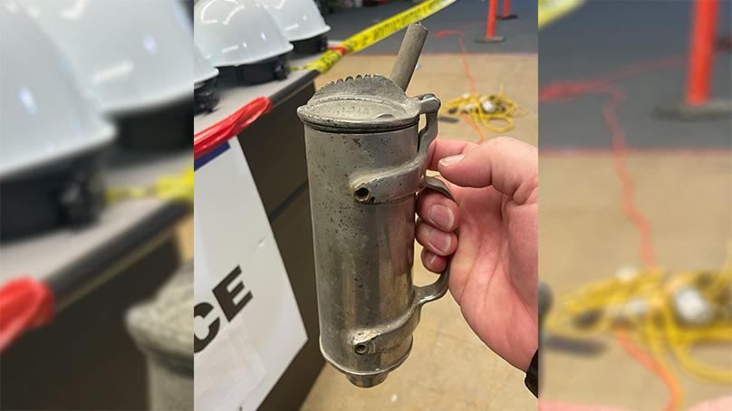 An ether dispenser likely used as part of medical treatment was found with 1913 etched on the top.